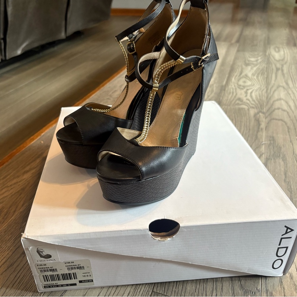 Aldo Black and Gold T-Strap Wedge Sandals
